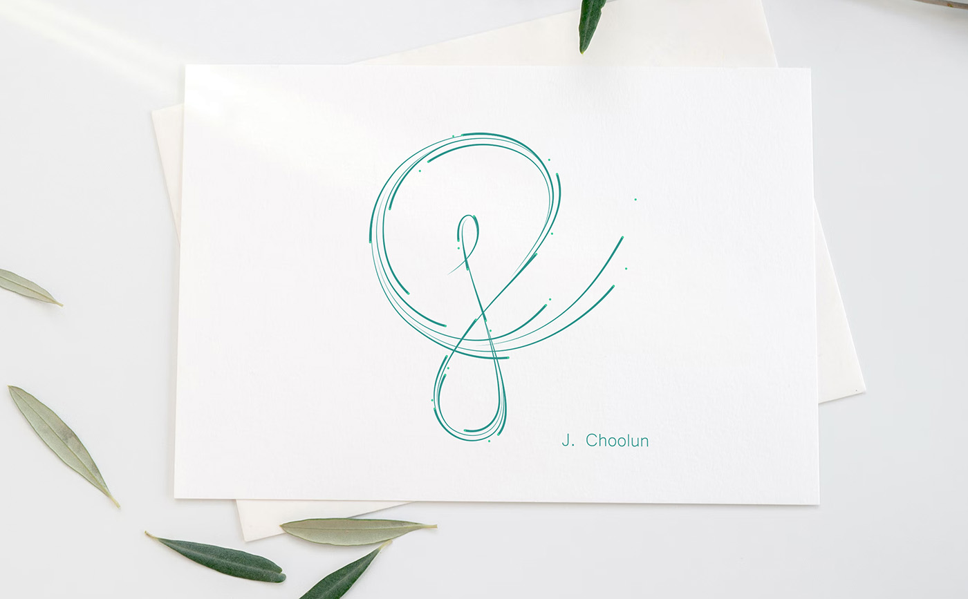 Jaret Choolun monogram logo on white paper
